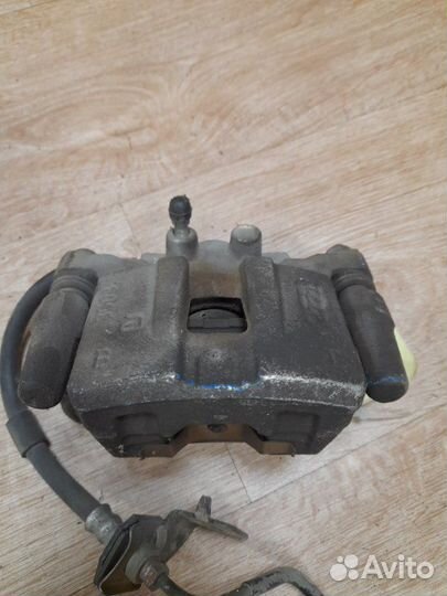 Суппорт тормозной задний левый Mitsubishi