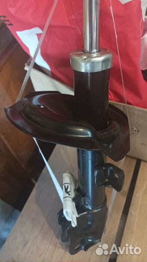 Стойка амортизатора Mitsubishi Outlander XL