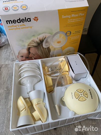 Молокоотсос двойной medela электрический