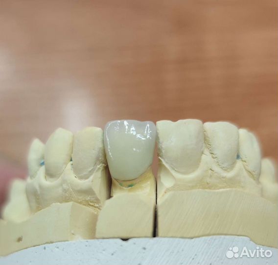 Зубной техник