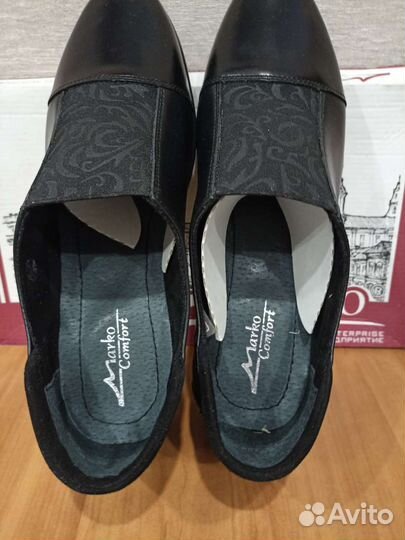 Новые кожаные туфли