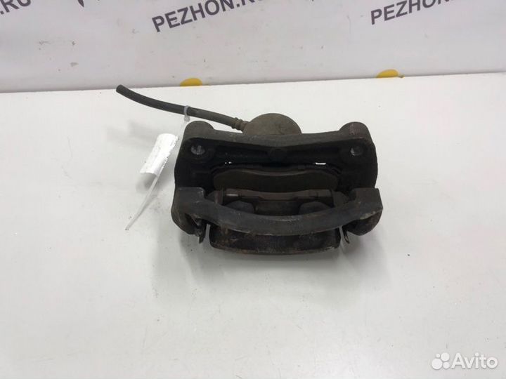 Суппорт тормозной передний левый Nissan Juke