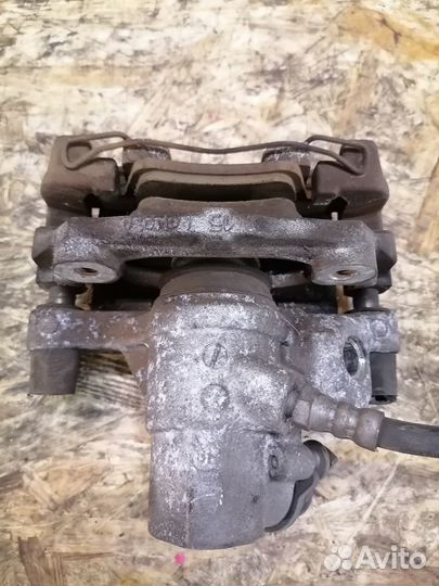 Тормозной суппорт задний правый Mazda 3 BL