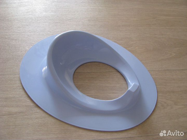 Новое детское сиденье для унитаза