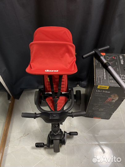 Детский велосипед с ручкой doona красный