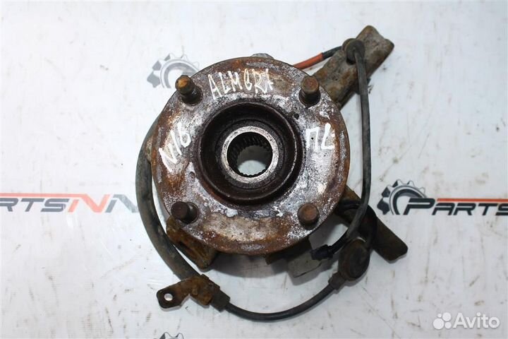 Кулак передний левый Ниссан Альмера N16