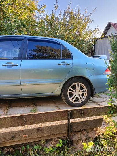 Mitsubishi Lancer 1.6 AT, 2006, 190 000 км