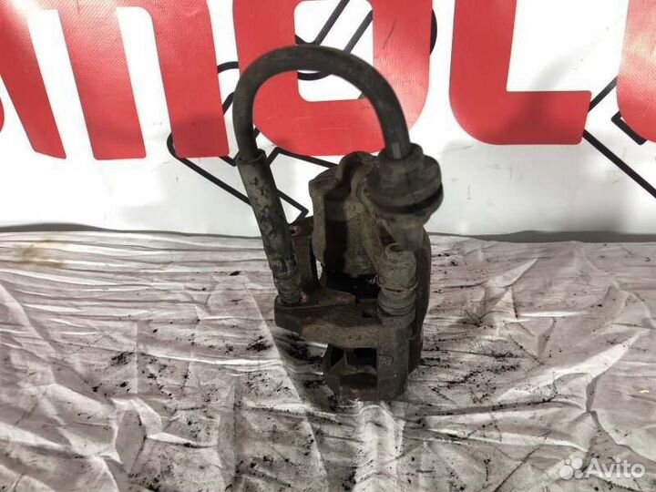 Суппорт тормозной передний правый Opel Corsa D