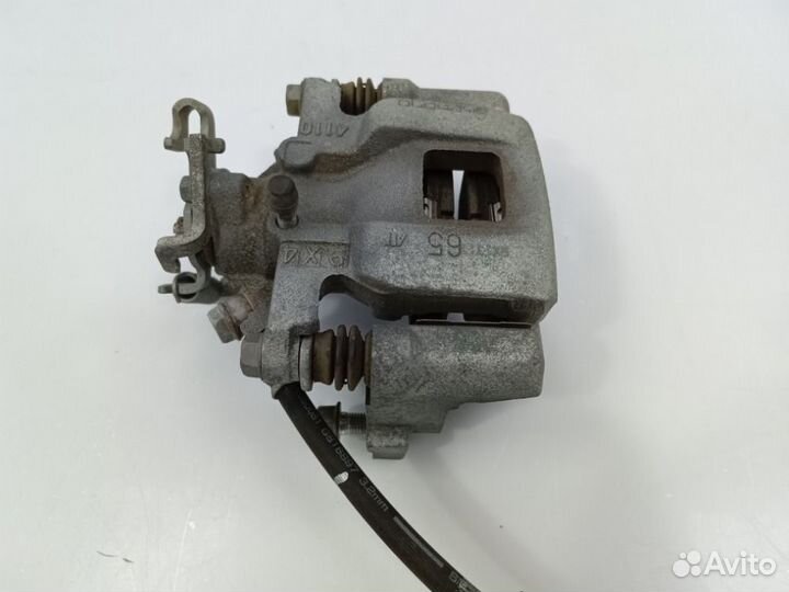 Суппорт тормозной задний левый Outlander 2012-2021