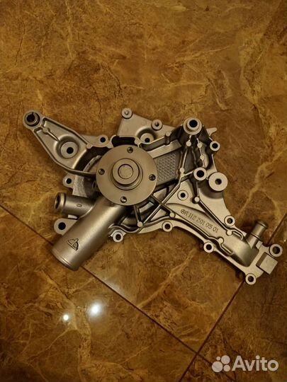Помпа Mercedes A1122010501