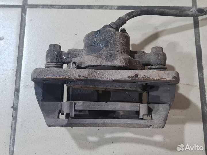 Суппорт передний Kia Spectra