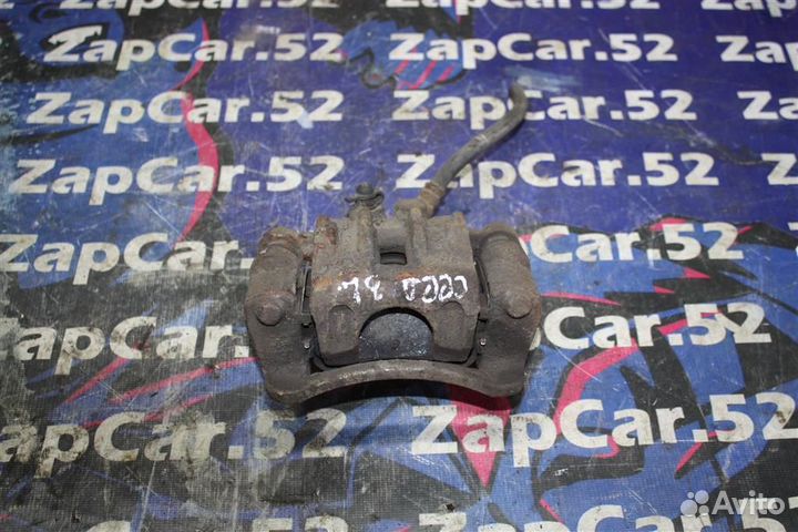 Суппорт задний левый Киа Сид