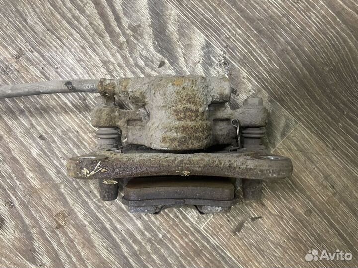 Суппорт тормозной зад правый ASX Lancer, Outlander