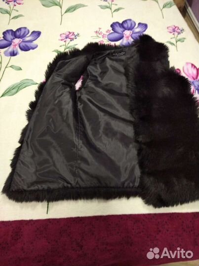 Меховая жилетка