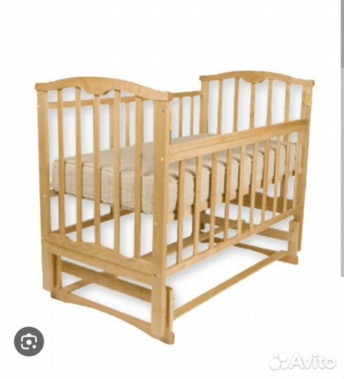 Детская кроватка с маятником