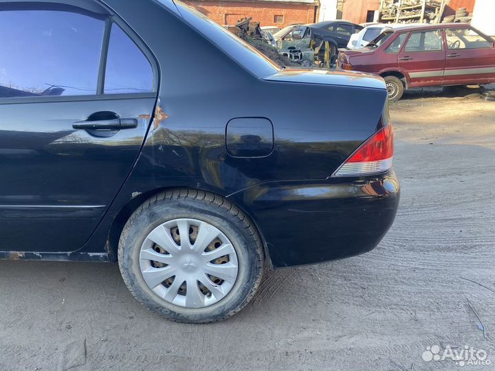 Крыло заднее левое Mitsubishi Lancer 9