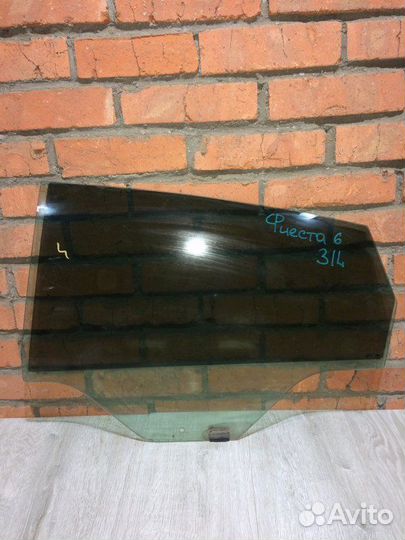 Стекло опускное заднее левое Ford Fiesta MK6 2009