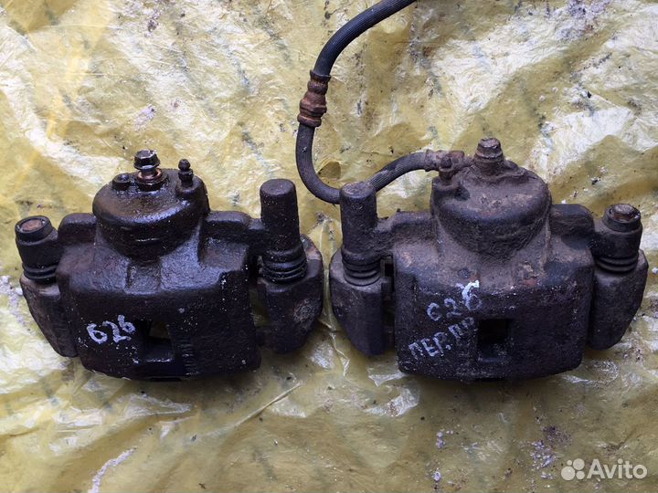 Суппорт тормозной передний Mazda 626 GE 91-97 гг