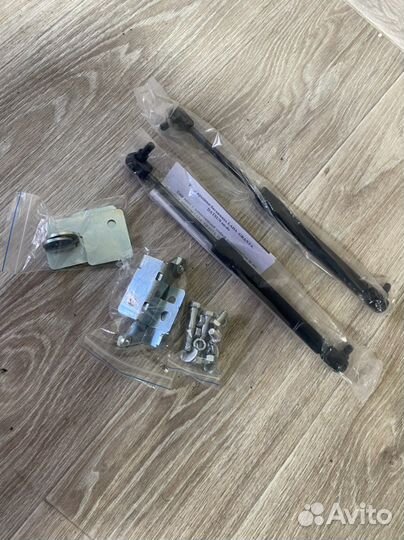 Газовые упоры багажника granta