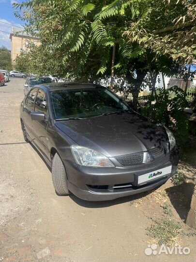 Mitsubishi Lancer 1.6 МТ, 2006, 266 000 км