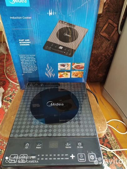 Индукционная плита Midea настольная
