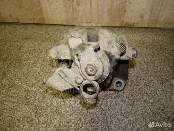 Суппорт задний левый Peugeot 308