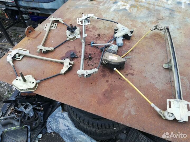 Стеклоподъемник двери Нива Шевроле