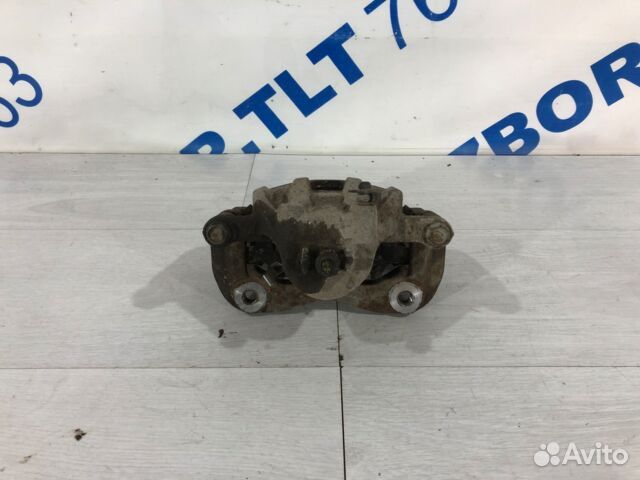 Суппорт передний правый KIA RIO 3 рест 1.4 AT хетч