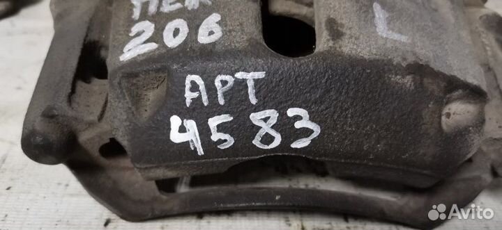 Суппорт передний левый Peugeot 206