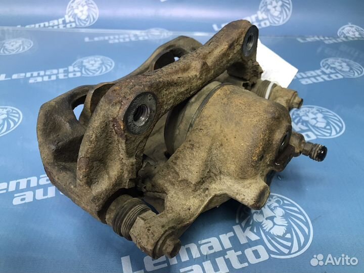 Суппорт тормозной передний левый Chevrolet Aveo