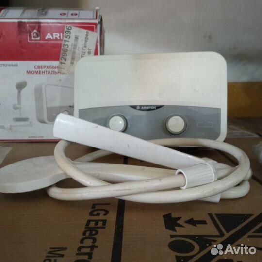 Нагреватель проточный Ariston