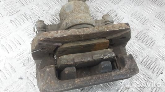 Суппорт тормозной задний левый mazda CX-7 1 (KUK08