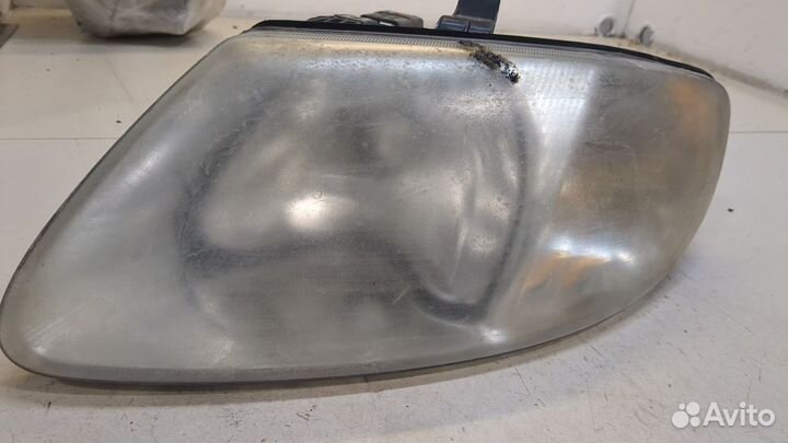 Фара (передняя) левая Dodge Caravan, 2006