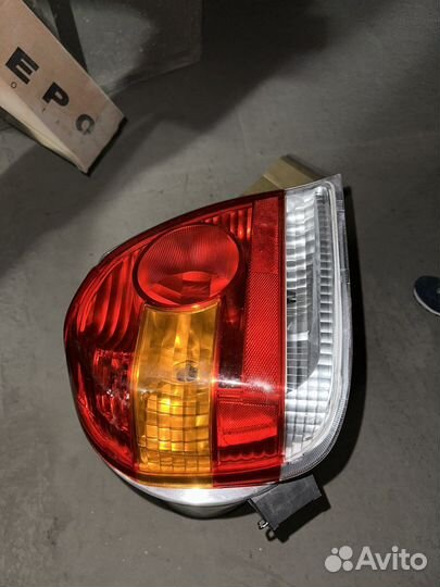 Фонарь задниц левый Toyota Echo