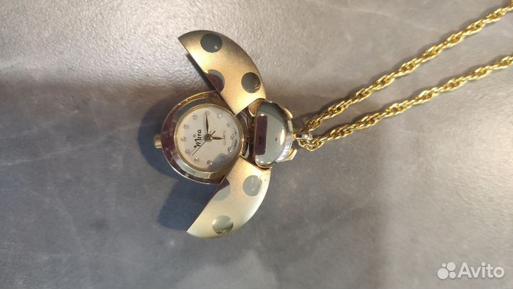Кулон- часы