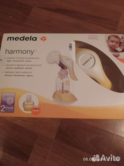 Молокоотсос medela ручной