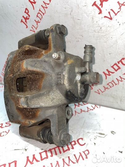 Суппорт тормозной передний левый Ford Escape L3