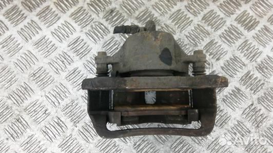 Суппорт тормозной передний левый KIA sportage 2 (2