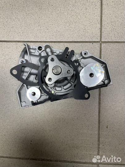 Насос водяной Kia Rio 1999 Новый