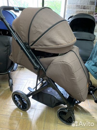 Прогулочная коляска с перекидной ручкой