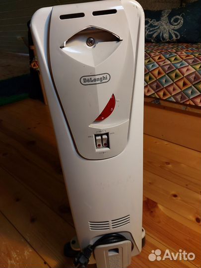 Масляный обогреватель Delonghi