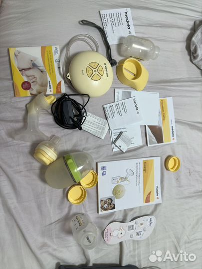 Молокоотсос medela swing электрический