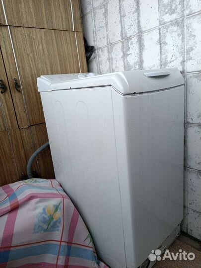 Стиральная машина с вертикальной загрузкой