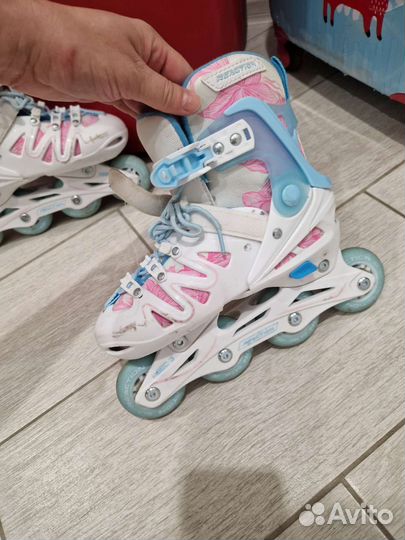 Роликовые коньки