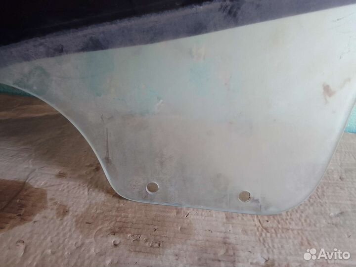 Стекло двери задние левое Renault Logan 1