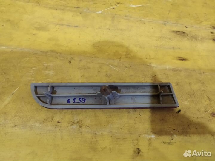 Отражатель задний Mitsubishi Lancer X