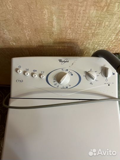 Стиральная машина с вертикальной загрузкой