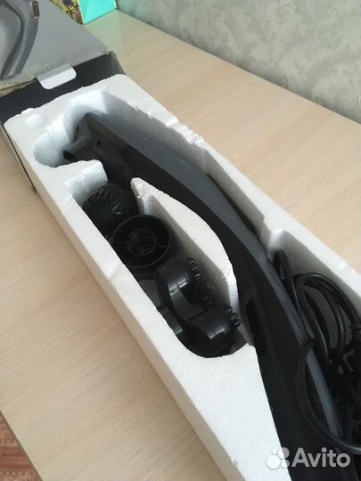 Ручной электрический массажер с насадками