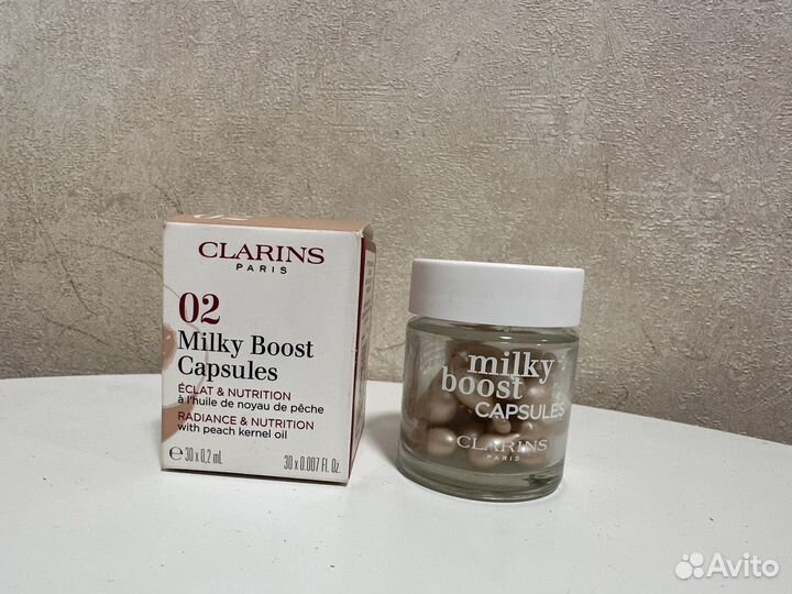 Clarins тональный флюид Milky Boost Capsules