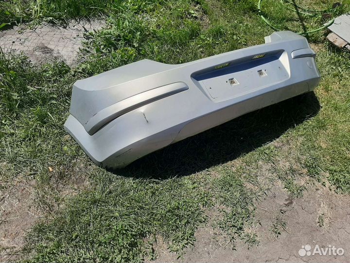 Задний бампер Опель астра Н хэтчбек